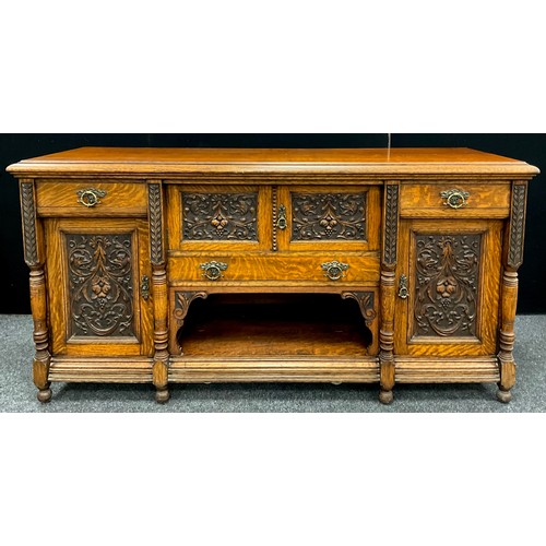 81A - A Victorian carved well-figured ‘Tiger’ oak sideboard, dresser base, 99.5cm high x 198.5cm wide x 61... 