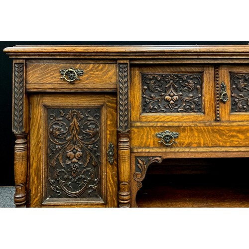 81A - A Victorian carved well-figured ‘Tiger’ oak sideboard, dresser base, 99.5cm high x 198.5cm wide x 61... 