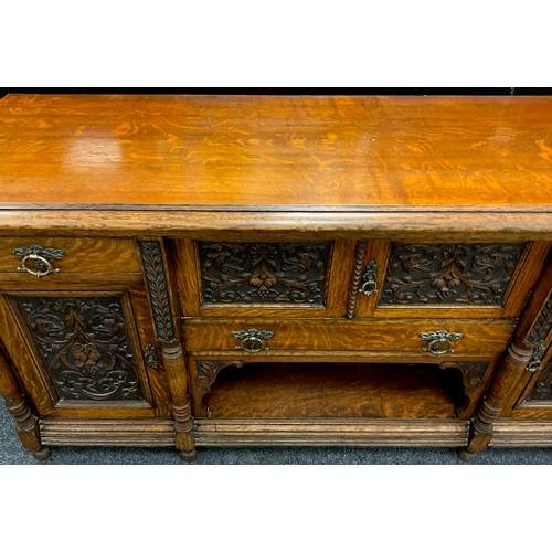 81A - A Victorian carved well-figured ‘Tiger’ oak sideboard, dresser base, 99.5cm high x 198.5cm wide x 61... 