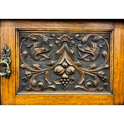 81A - A Victorian carved well-figured ‘Tiger’ oak sideboard, dresser base, 99.5cm high x 198.5cm wide x 61... 