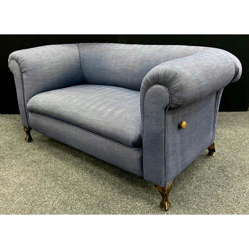 28A - A Victorian style Chesterfield or knowle drop-arm sofa, re-upholstered in herringbone chevron fabric... 