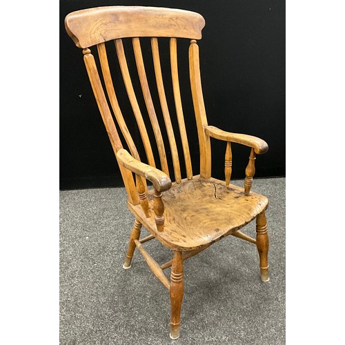 62A - A 19th century elm lath-back country chair, 110.5cm high (40.5cm to seat), 59.5cm wide.