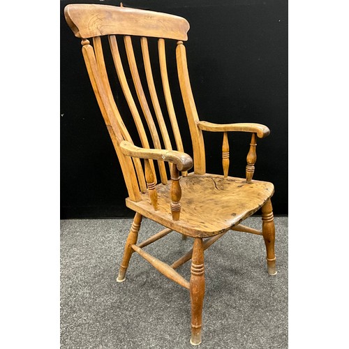 62A - A 19th century elm lath-back country chair, 110.5cm high (40.5cm to seat), 59.5cm wide.