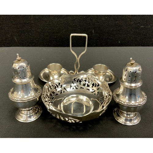 316 - Silver - a pierced circular bonbon dish, Birmingham 1942;  Goldsmiths & Silversmiths table stand, Lo... 