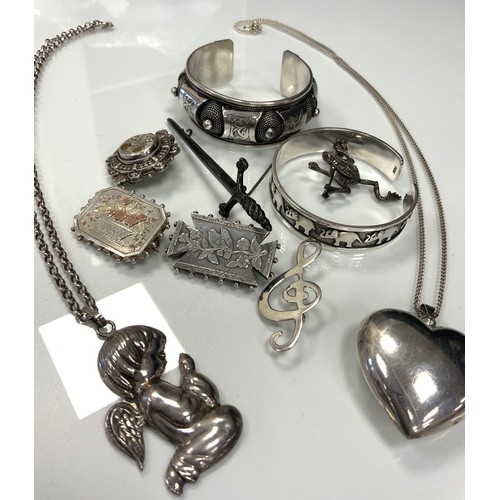 341 - An Victorian silver Aesthetic movement brooch, Birmingham 1888, another 1889, silver coloured metal ... 