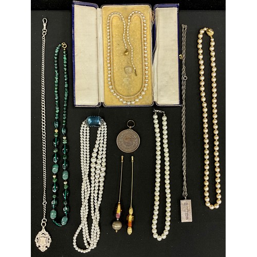 346 - Jewellery - a graduated link silver Albert chain, shield medal terminal, 39.5cm long overall, A 1970... 