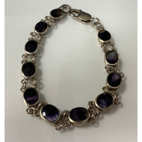 453 - A silver and blue john eleven section oval panel bracelet, stamped 925, 18.5cm long, cased