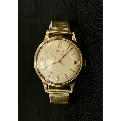 458 - An Avia 9ct gold cased wristwatch, domed silver dial, Arabic nemerals and block baton markers, date ... 