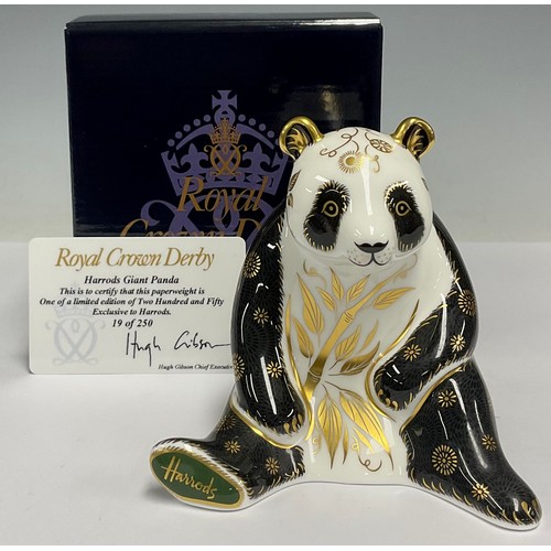 21 - A Royal Crown Derby paperweight, Harrods Giant Panda, exclusive to Harrods of Knightsbridge, hand si... 