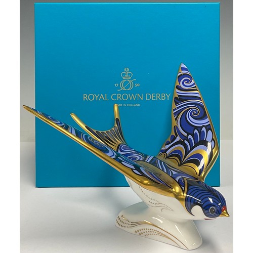 24 - A Royal Crown Derby paperweight, Swallow, printed mark in grey, gold stopper, boxed