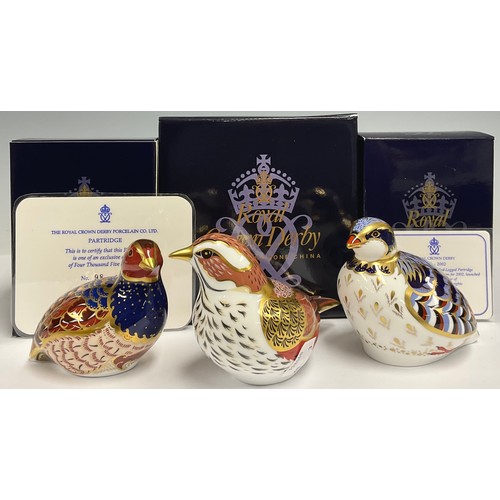 27 - A Royal Crown Derby paperweight, Redwing, Collectors Guild exclusive, gold stopper, boxed; others, P... 