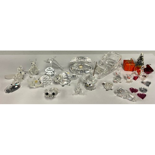 41 - A quantity of Swarovski crystal animals including Kangaroo, Beaver, Rhinoceros, Christmas Sleigh, Fr... 