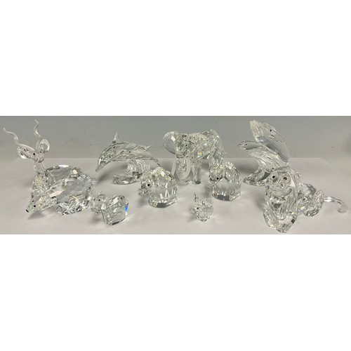 43 - A graduated set of five crystal Swarovski elephants; other animals including Reindeer, Dolphins, Lio... 