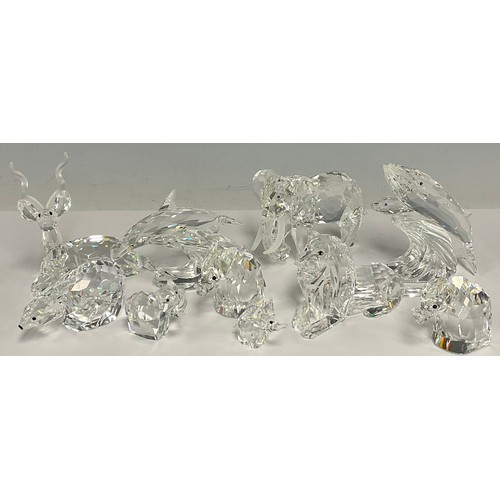 43 - A graduated set of five crystal Swarovski elephants; other animals including Reindeer, Dolphins, Lio... 