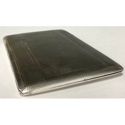 61 - A George VI silver cigarette case, machined body, gilt interior, 12.5cm x 8.5cm, Birmingham 1946, 19... 