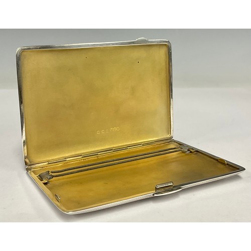 61 - A George VI silver cigarette case, machined body, gilt interior, 12.5cm x 8.5cm, Birmingham 1946, 19... 