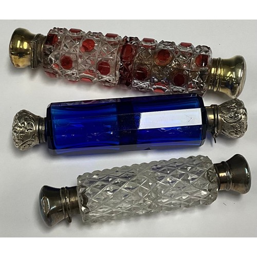 64 - A 19th century ruby flashed glass double ended scent bottle, S. Mordan & Co., London, 14.5cm long; o... 