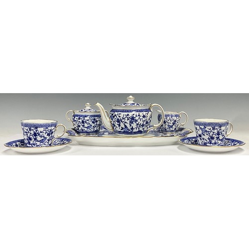 131 - Ceramics - a Royal Crown Derby blue and white pattern cabaret tea service, comprising tea pot, sucri... 