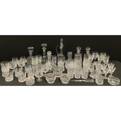 143 - Glassware - a pair of cut glass canted rectangular decanters; a cut glass ships decanter; other deca... 