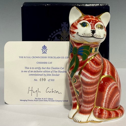 303 - A Royal Crown Derby paperweight, Cheshire Cat, limited edition 490/500, commissioned by John Sinclai... 