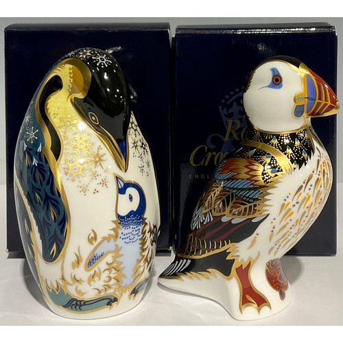 306 - A Royal Crown Derby paperweight, Penguin and Chick, gold stopper, boxed; another, Puffin, gold stopp... 