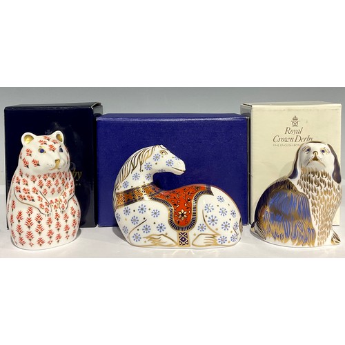 308 - A Royal Crown Derby paperweight, Horse, gold stopper, boxed; others, King Charles Spaniel, gold stop... 