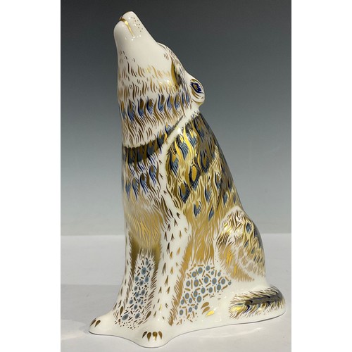 4 - A Royal Crown Derby paperweight, Wolf, 13cm high, printed marks in red, gold stopper