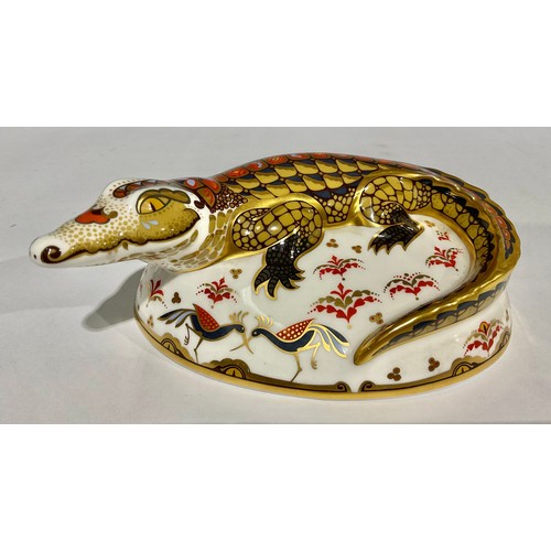 9 - A Royal Crown Derby paperweight, Crocodile, 17cm long, printed marks in gold, gold stopper