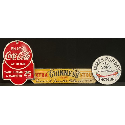 327 - A reproduction shaped rectangular tin advertising sign, Enjoy Coca-Cola At Home, 35.5cm x 25.5cm; a ... 