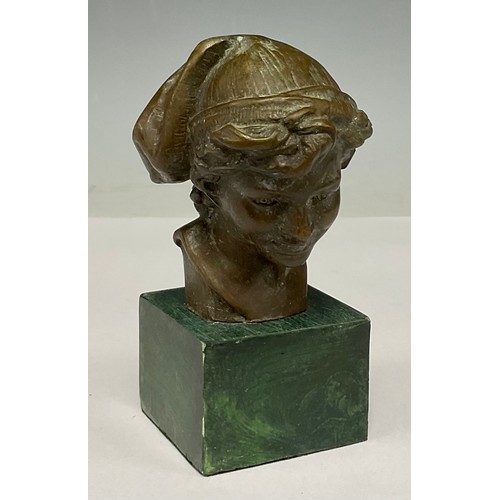 331 - A bronzed metal bust, Boy with cloth cap, green stone plinth, 13.5cm high