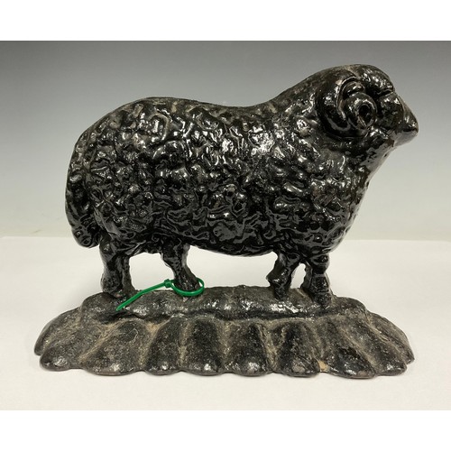 335 - A cast iron novelty door stop, as a sheep