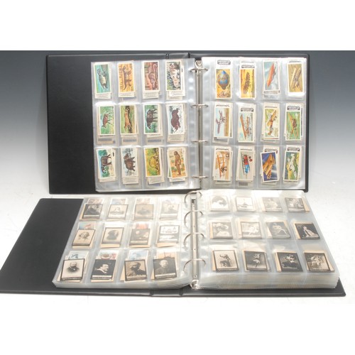 347 - Two albums of cigarette/tea cards plus silks, album 1, 1900 Early Ogdens Guinea Gold, x 150, actress... 