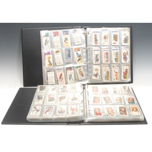 347 - Two albums of cigarette/tea cards plus silks, album 1, 1900 Early Ogdens Guinea Gold, x 150, actress... 