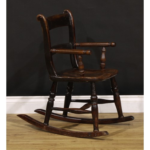 404 - A Victorian vernacular beech and elm child’s bar-back chair, later converted to a rocking chair, 75.... 
