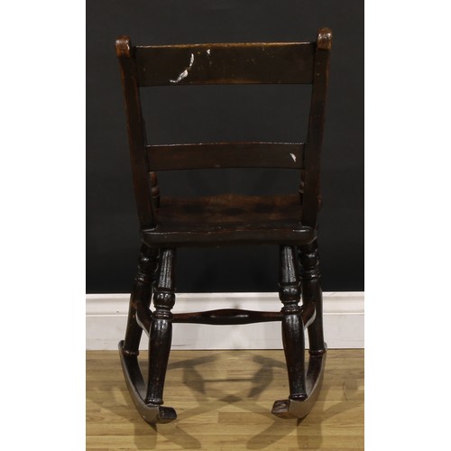 404 - A Victorian vernacular beech and elm child’s bar-back chair, later converted to a rocking chair, 75.... 