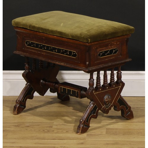 408 - An Arts & Crafts walnut, parcel-gilt and ebonised stool, hinged seat with stuffed-over upholstery, s... 