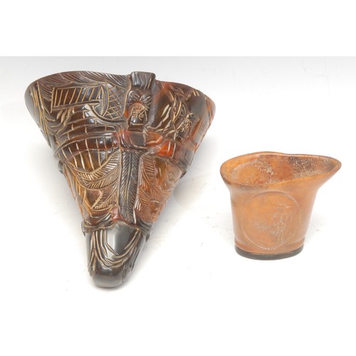 479 - A reproduction moulded and carved resin libation cup, 14cm; another smaller, moulded with a snarling... 