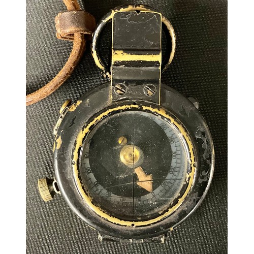 487 - A military marching compass, mark IX, leather case