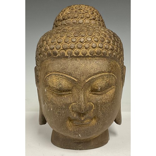 78 - A reproduction Chinese reconstituted stone carved head, of Buddha, 25cm high