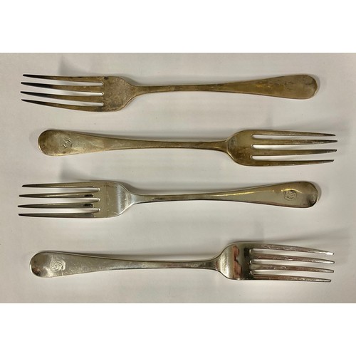 82 - A George III silver table fork, London 1810; a George IV silver table fork, London 1825; other Georg... 