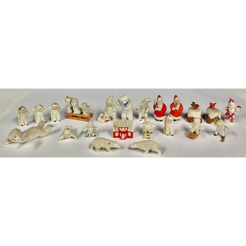 97 - Early 20th century German porcelain Snow Babies Christmas cake toppers; others, polar bears, Father ... 