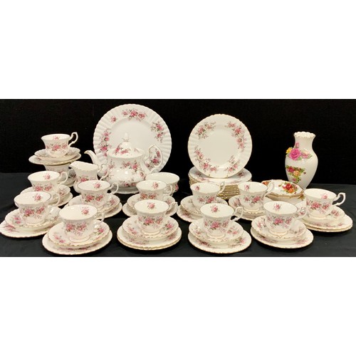 90 - Royal Albert Lavender Rose tea service for twelve including; a tea pot, milk jug, sugar bowl, twelve... 