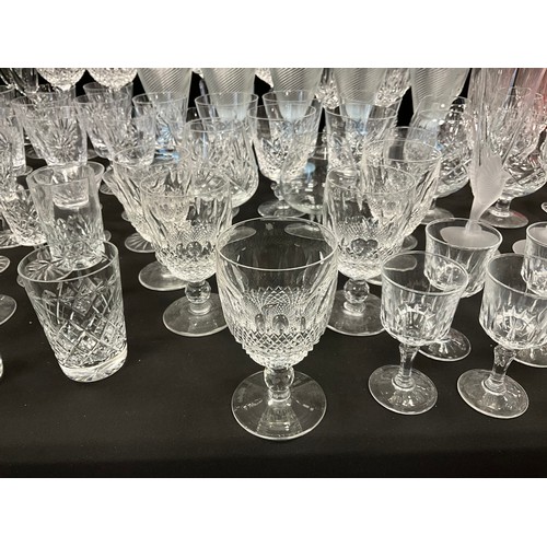 96 - Glass - a quantity of glassware including; a set of ten Waterford cut glass wine glasses, set of fou... 