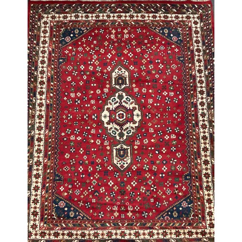 108 - A Persian Hamadan type rug, hand-knotted with central lobed medallion, within a field of stylised fl... 