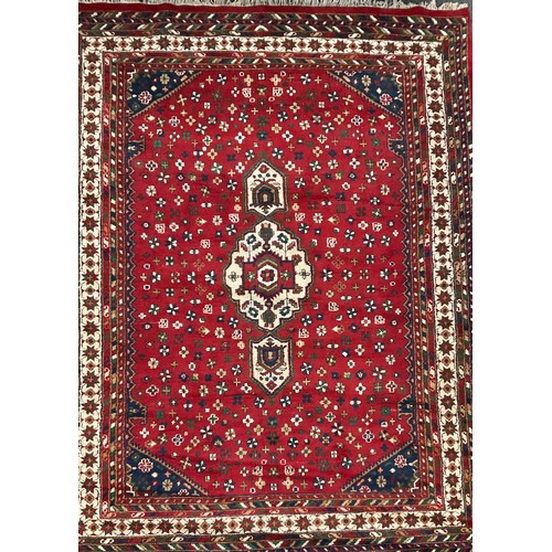 108 - A Persian Hamadan type rug, hand-knotted with central lobed medallion, within a field of stylised fl... 