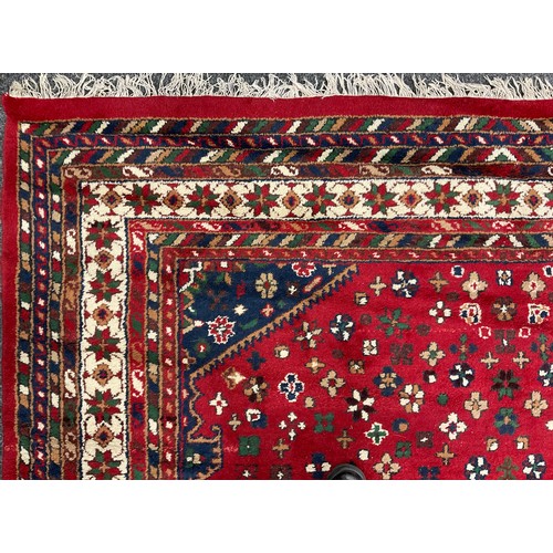 108 - A Persian Hamadan type rug, hand-knotted with central lobed medallion, within a field of stylised fl... 