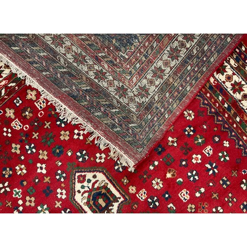 108 - A Persian Hamadan type rug, hand-knotted with central lobed medallion, within a field of stylised fl... 