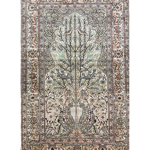 165 - A Turkish Kelsarie silk rug / carpet, hand-knotted with ‘Tree of Life’, design, in soft tones of cre... 