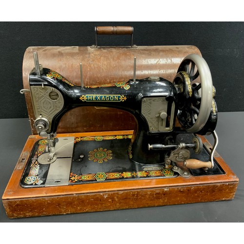 185 - A Vintage 'Hexagon' sewing machine, wooden case.