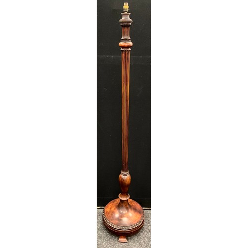 193 - An early to mid 20th century standard lamp, turned and reeded column, turned circular base, 158cm hi... 